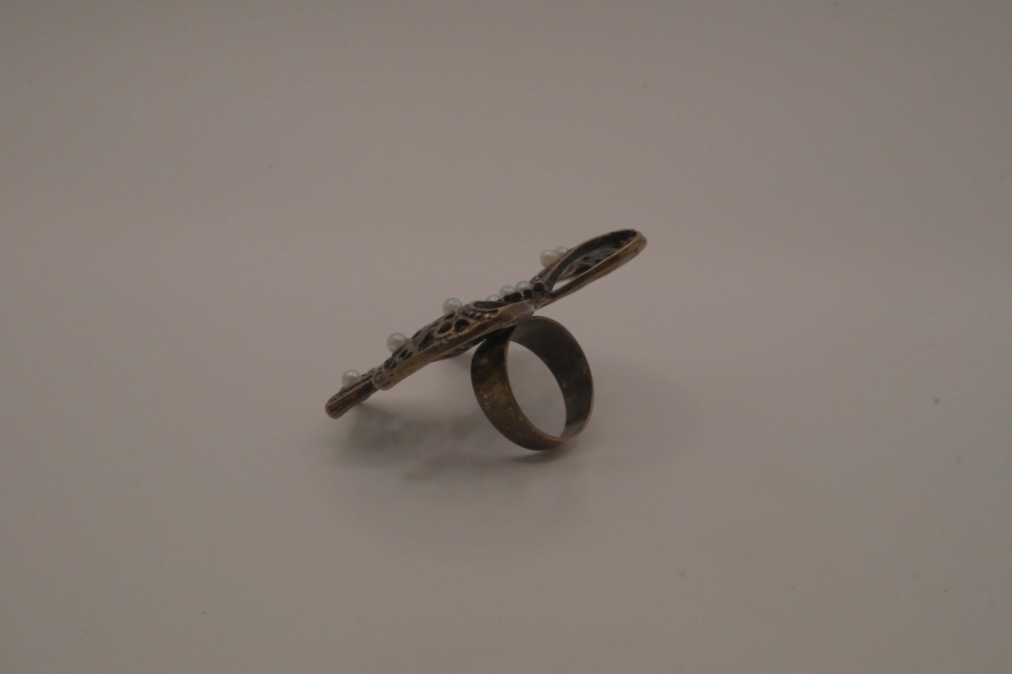 Vintage bronze-tone filigree Statement bow ring