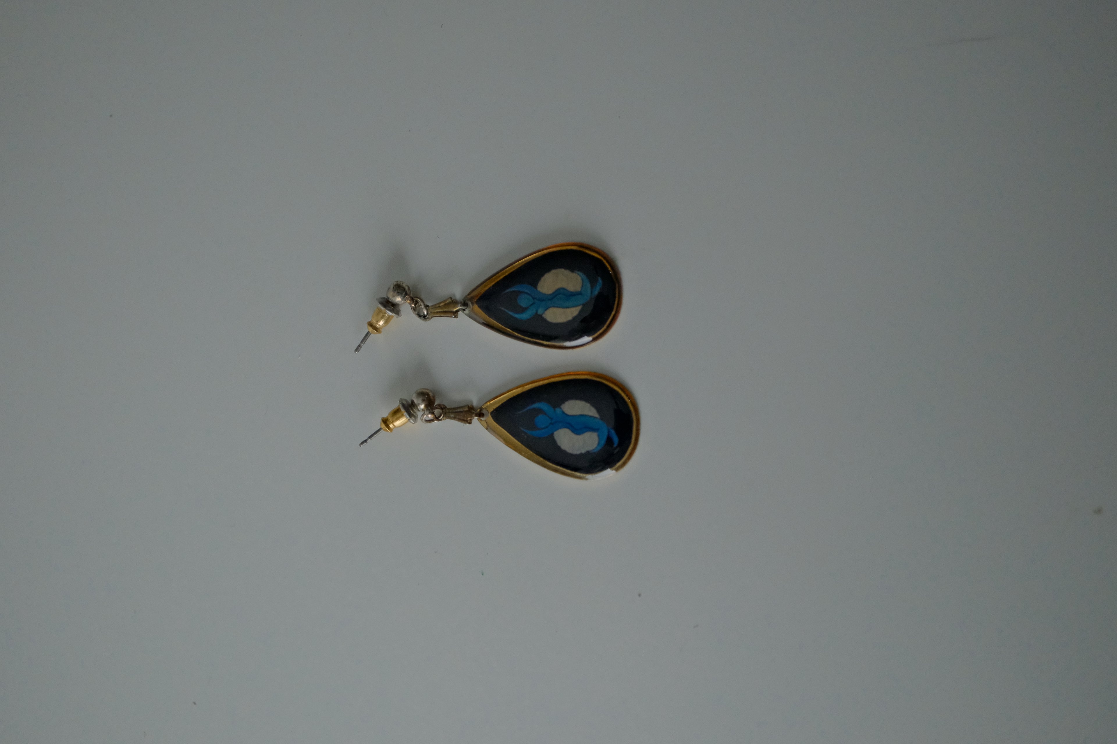 Blue Woman with Moon Teardrop Earrings