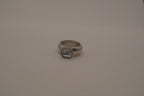 Vintage chunky silver ring with an emerald-cut clear stone
