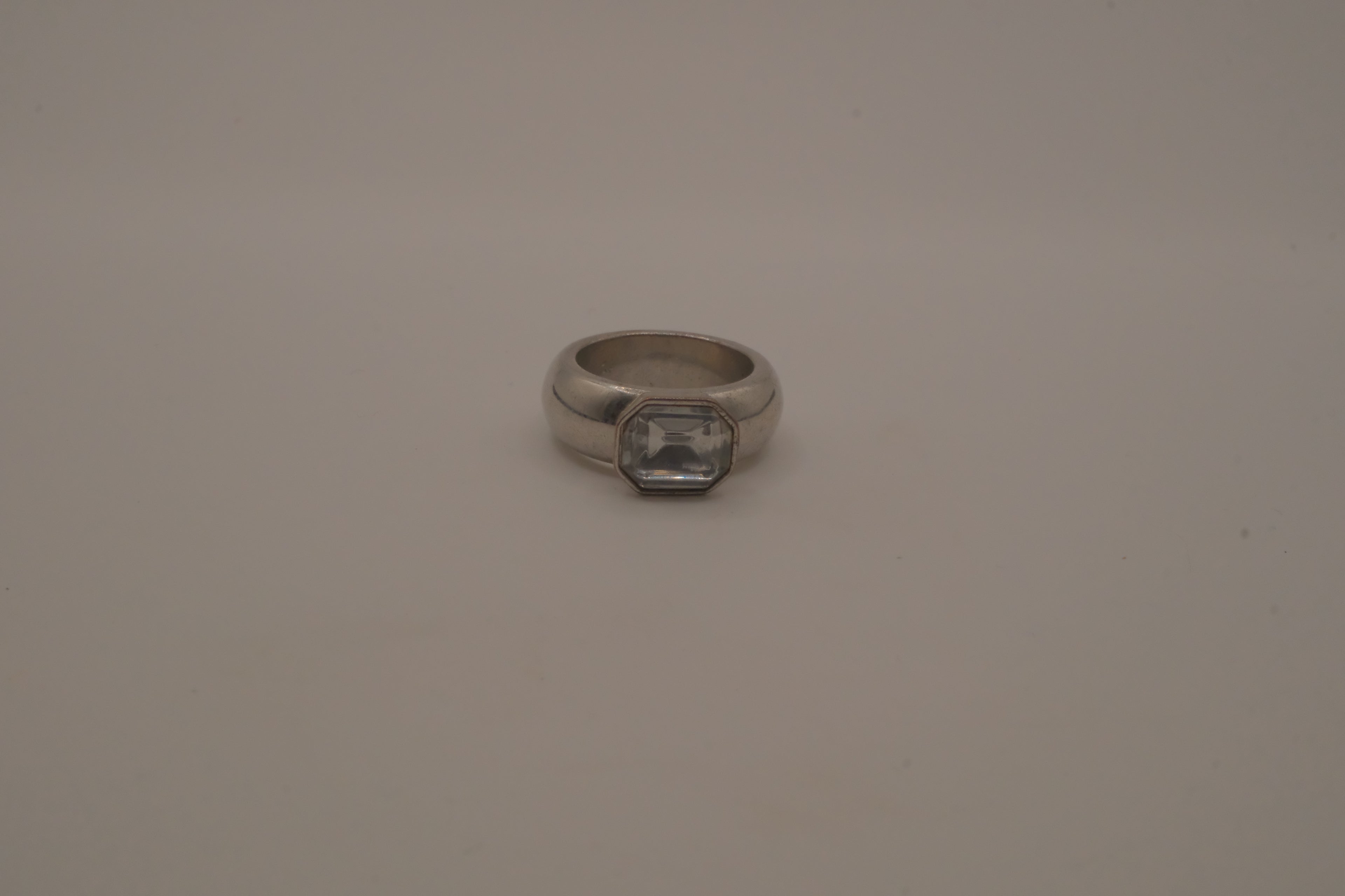 Vintage chunky silver ring with an emerald-cut clear stone