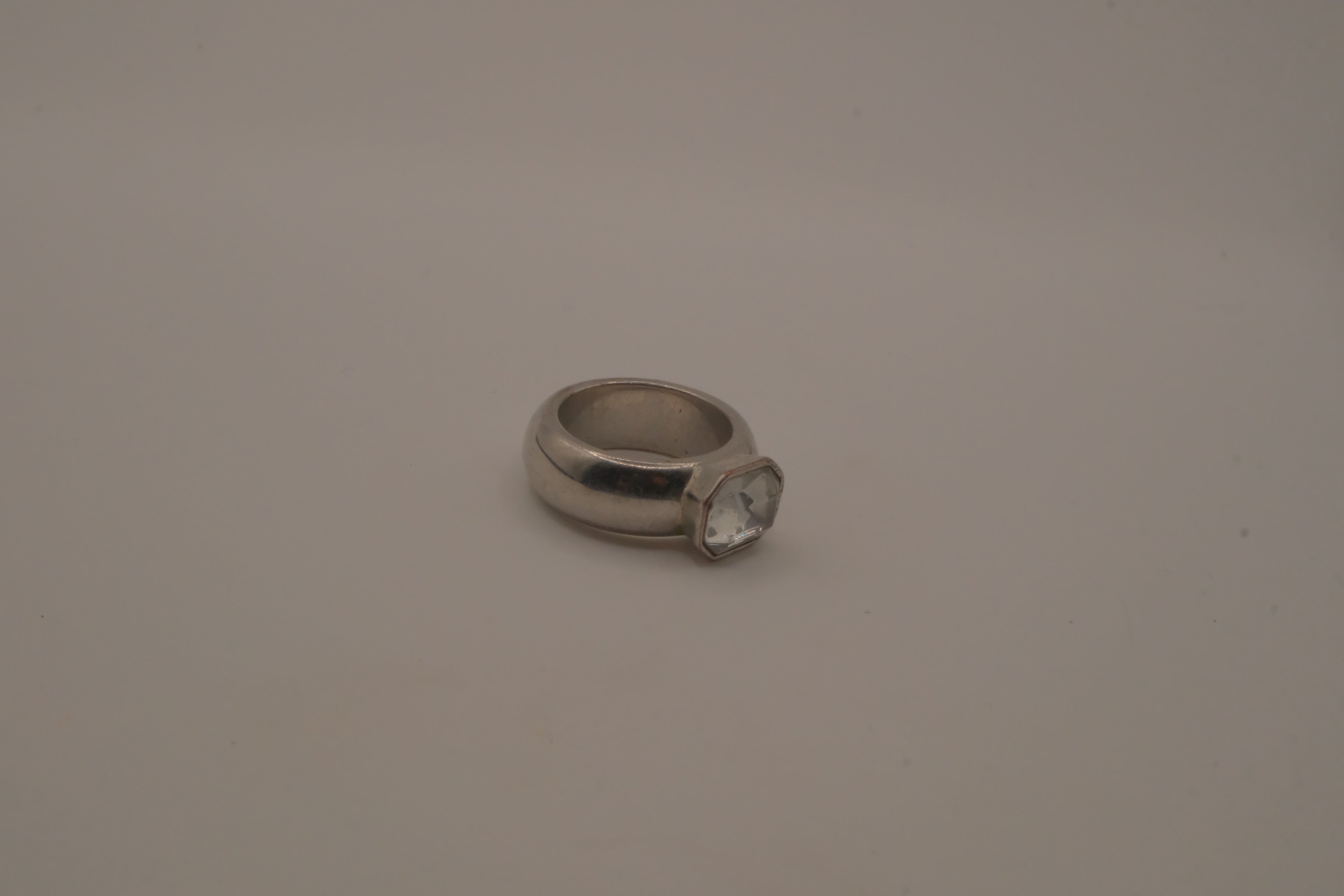 Vintage chunky silver ring with an emerald-cut clear stone
