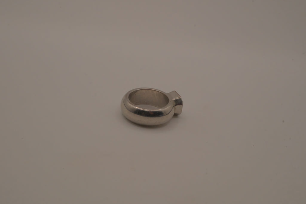 Vintage chunky silver ring with an emerald-cut clear stone