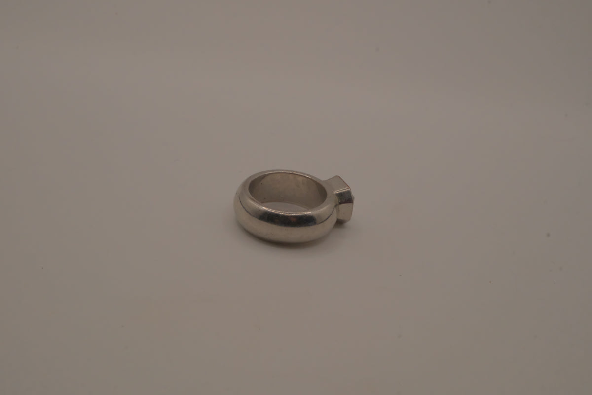 Vintage chunky silver ring with an emerald-cut clear stone