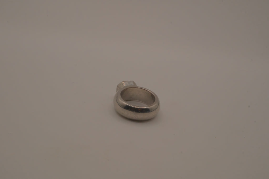 Vintage chunky silver ring with an emerald-cut clear stone