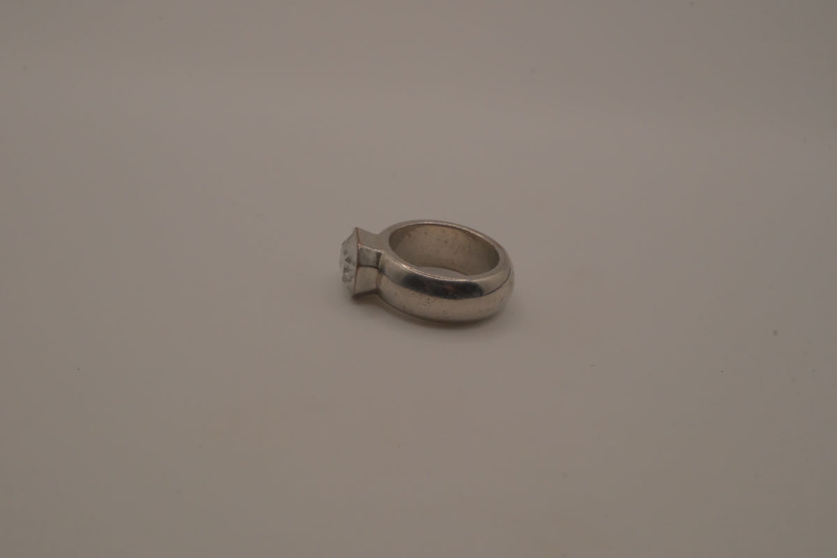 Vintage chunky silver ring with an emerald-cut clear stone