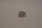 Vintage chunky silver ring with an emerald-cut clear stone