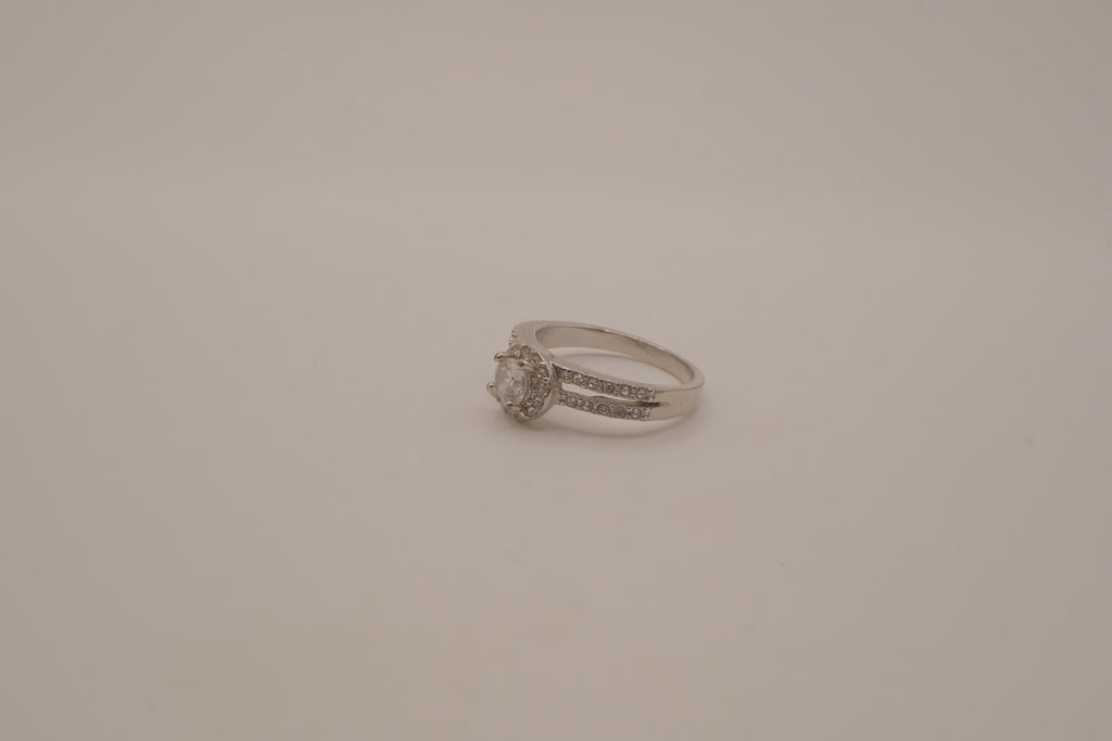 Silver tone halo ring with split-shank band