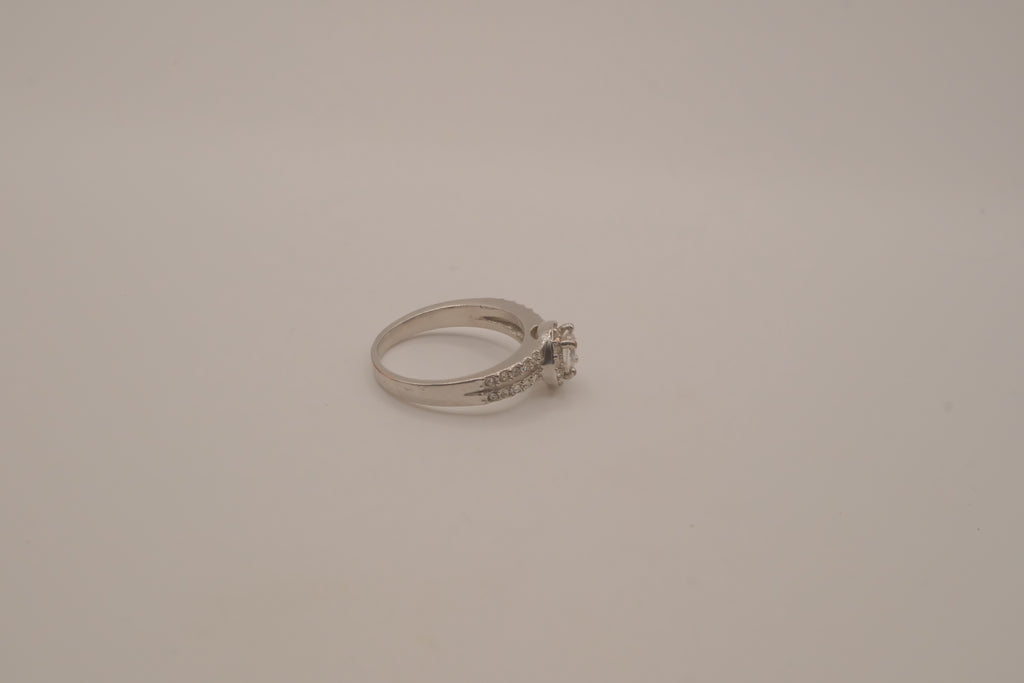 Silver tone halo ring with split-shank band