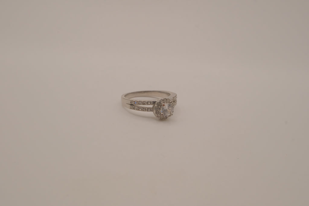 Silver tone halo ring with split-shank band
