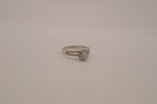 Silver tone halo ring with split-shank band