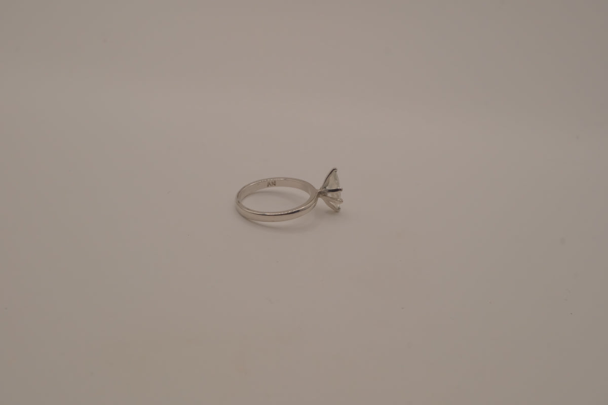 Silver tone marquise-cut solitaire ring