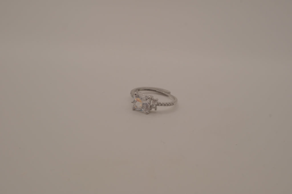 Elegant three-stone engagement-style ring