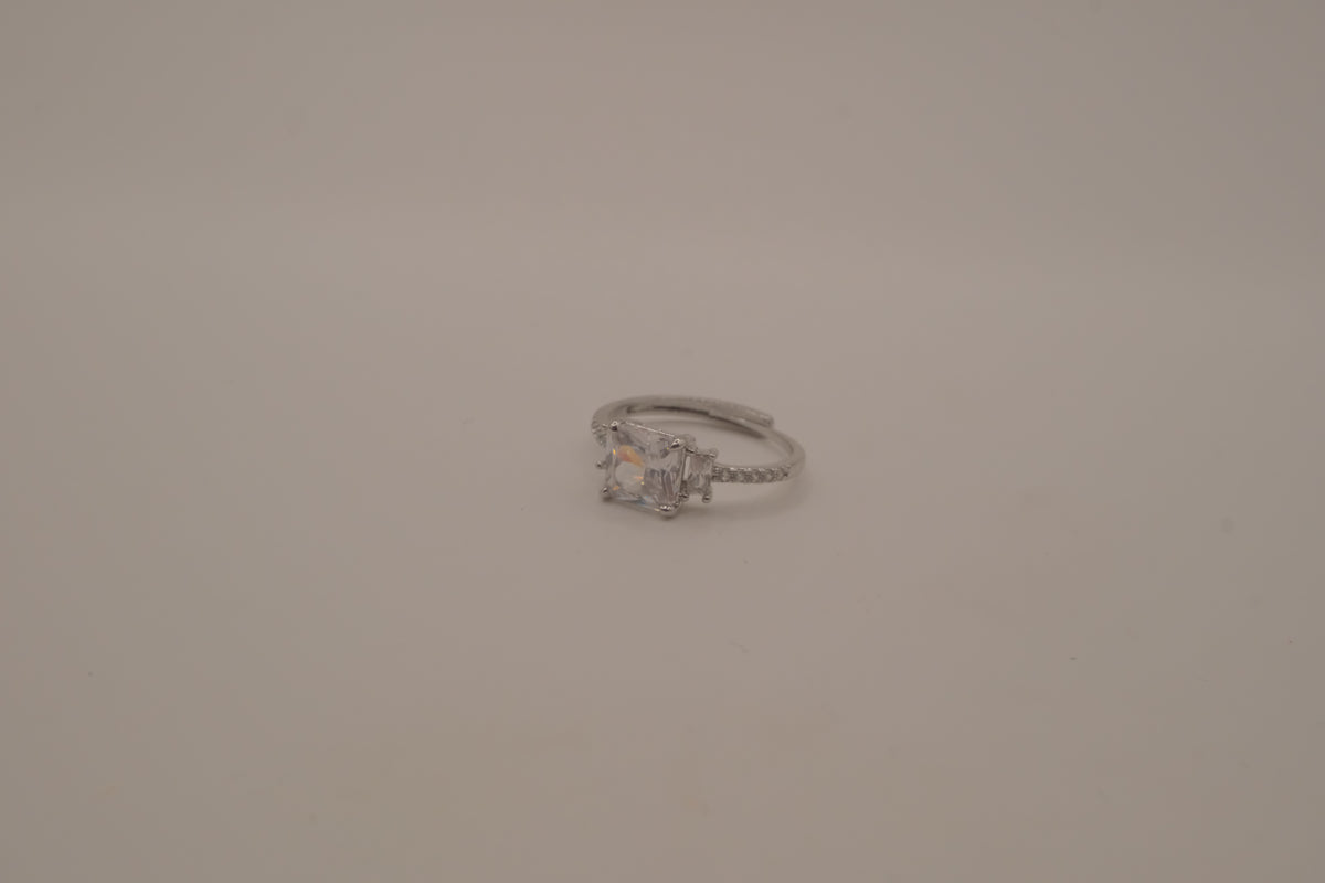 Elegant three-stone engagement-style ring