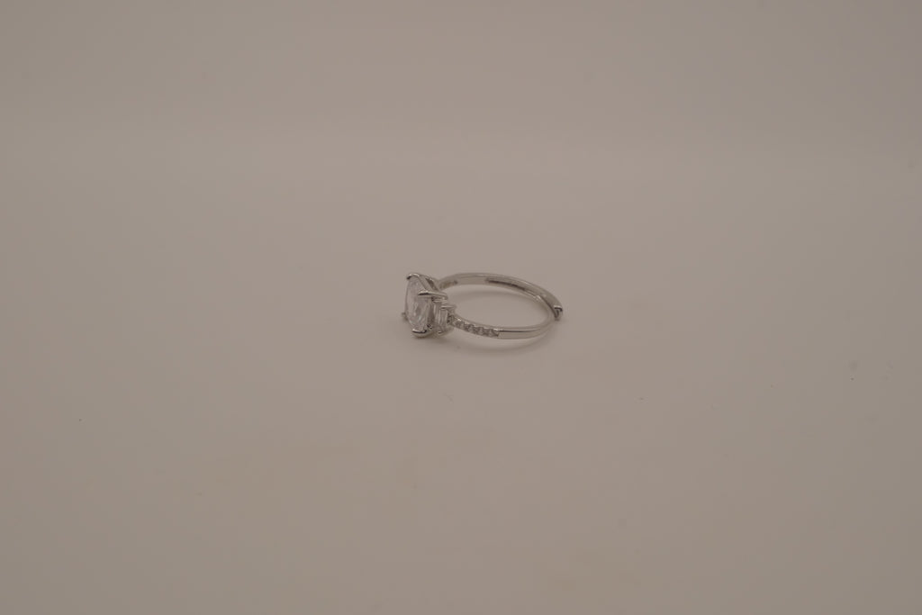 Elegant three-stone engagement-style ring