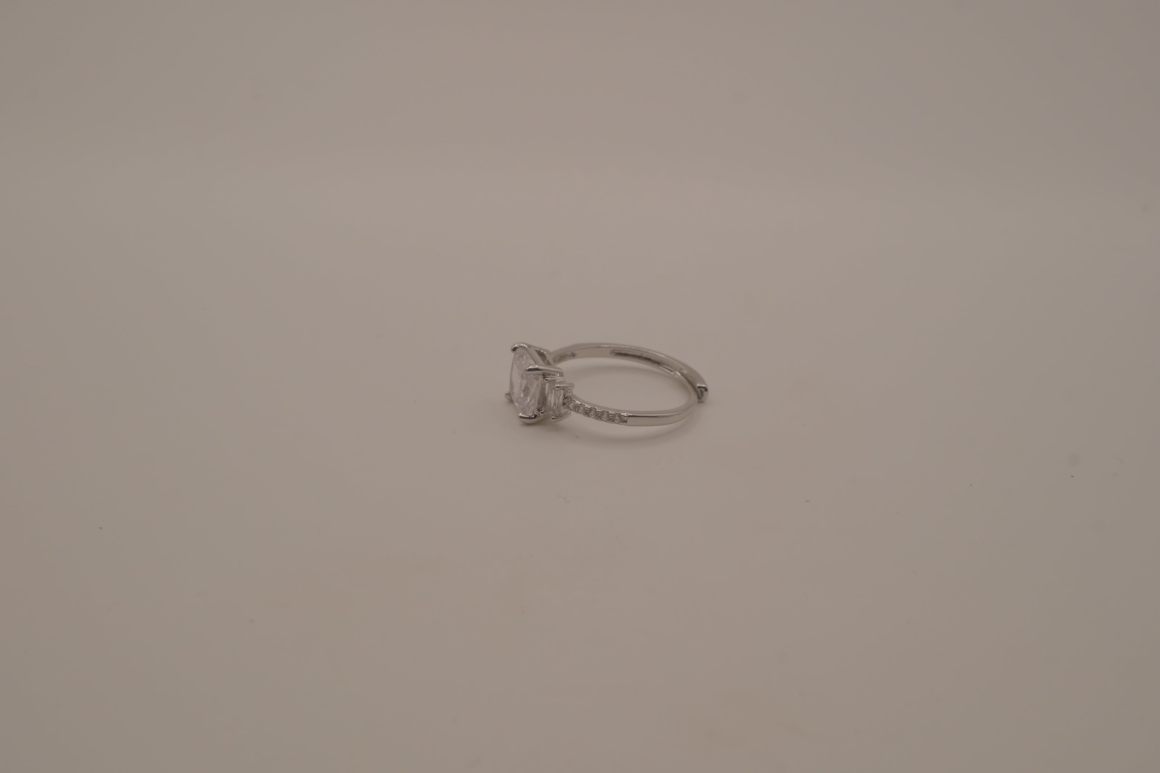 Elegant three-stone engagement-style ring