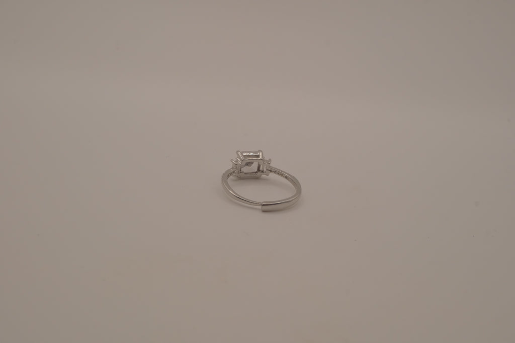 Elegant three-stone engagement-style ring