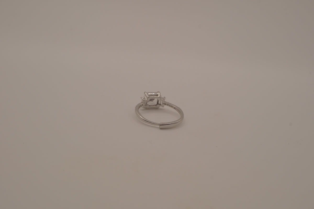 Elegant three-stone engagement-style ring
