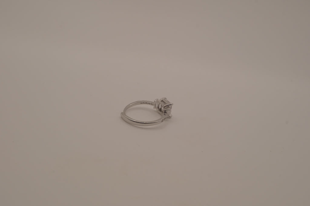 Elegant three-stone engagement-style ring