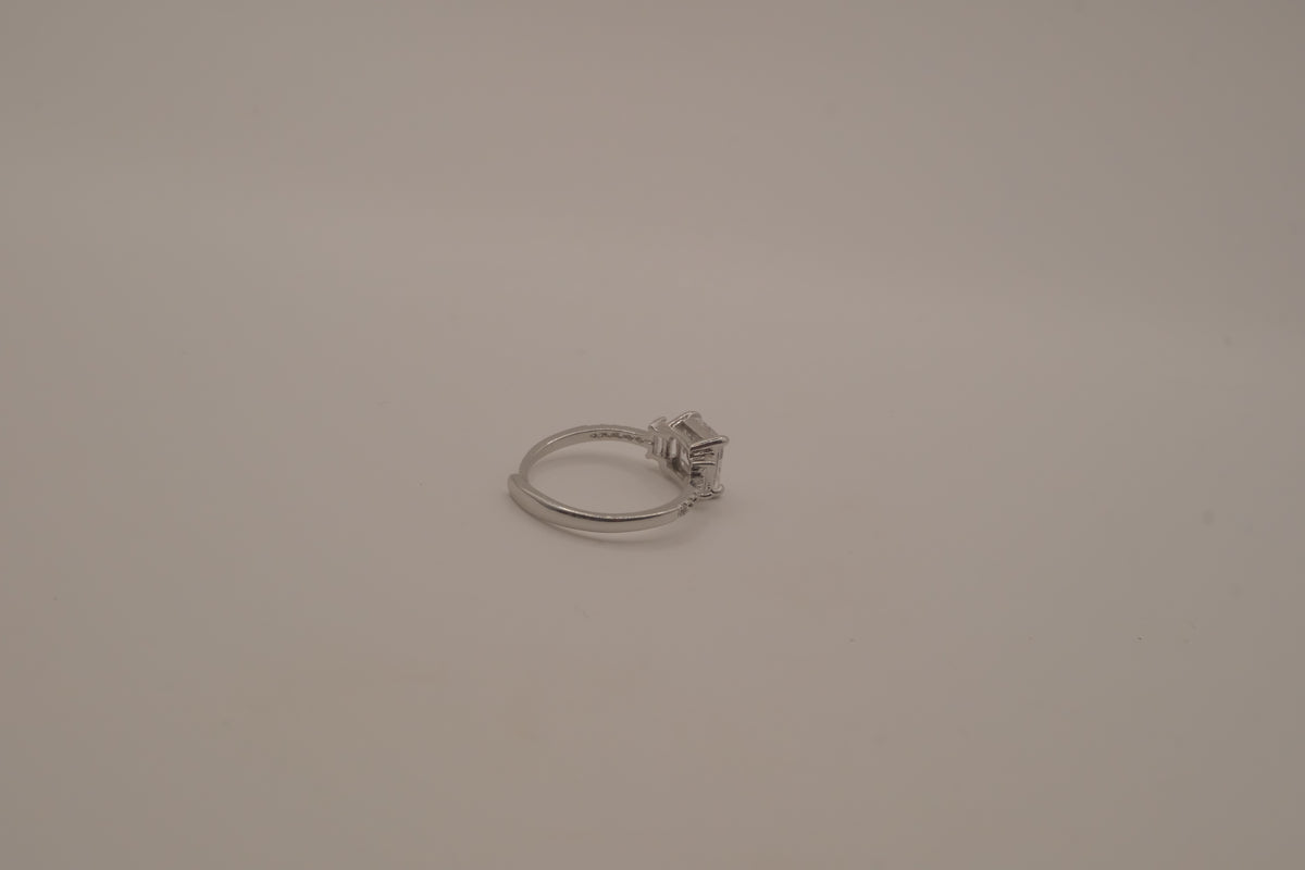 Elegant three-stone engagement-style ring