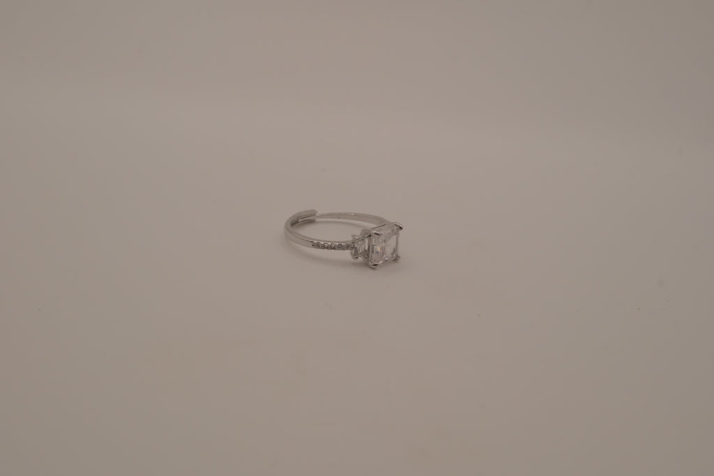 Elegant three-stone engagement-style ring