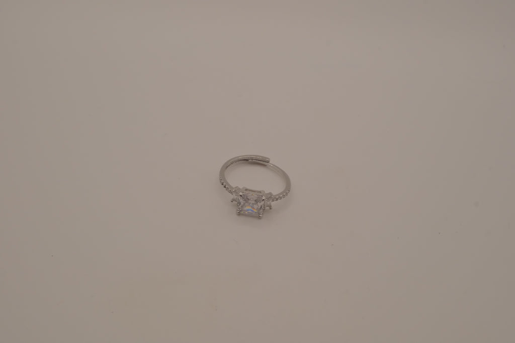Elegant three-stone engagement-style ring