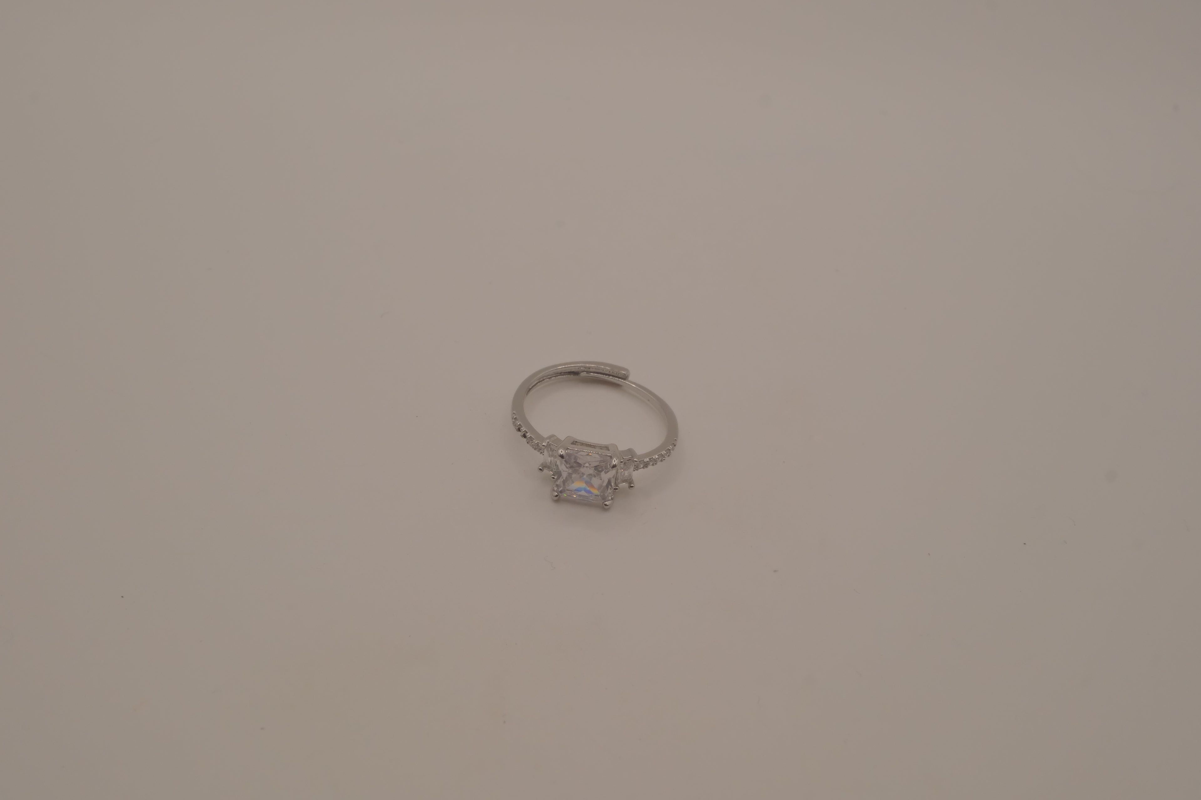 Elegant three-stone engagement-style ring