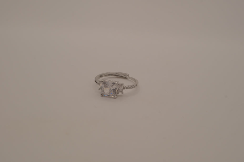 Elegant three-stone engagement-style ring