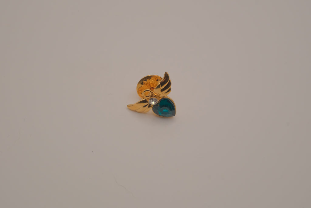 Vintage Avon gold-tone angel May birthstone lapel/bag  pin