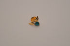 Vintage Avon gold-tone angel May birthstone lapel/bag  pin