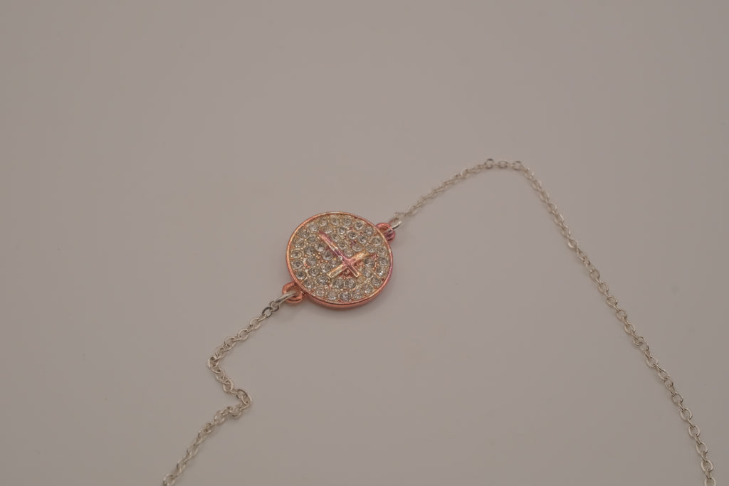 Vintage Avon rhinestone cross disc bracelet