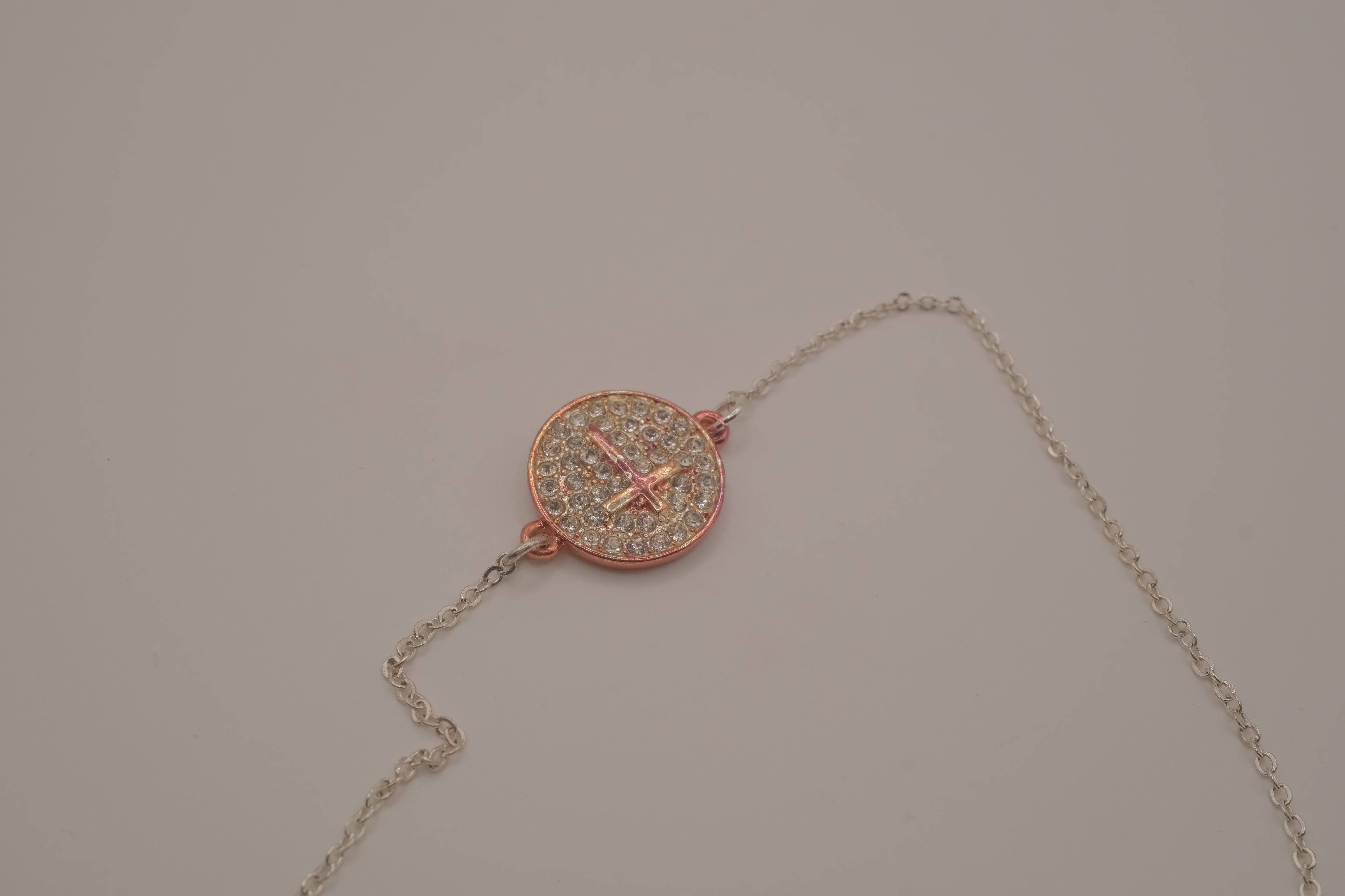 Vintage Avon rhinestone cross disc bracelet