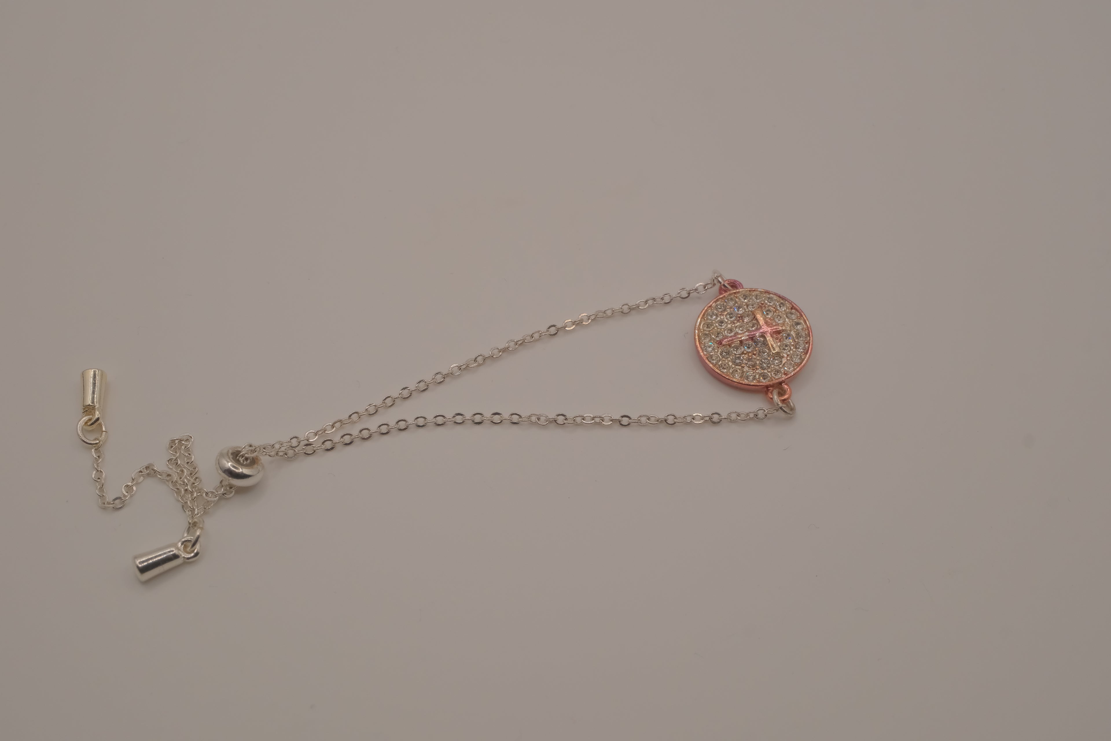 Vintage Avon rhinestone cross disc bracelet