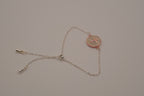 Vintage Avon rhinestone cross disc bracelet