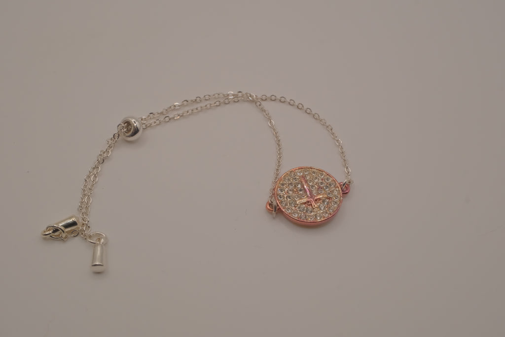 Vintage Avon rhinestone cross disc bracelet