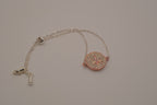 Vintage Avon rhinestone cross disc bracelet