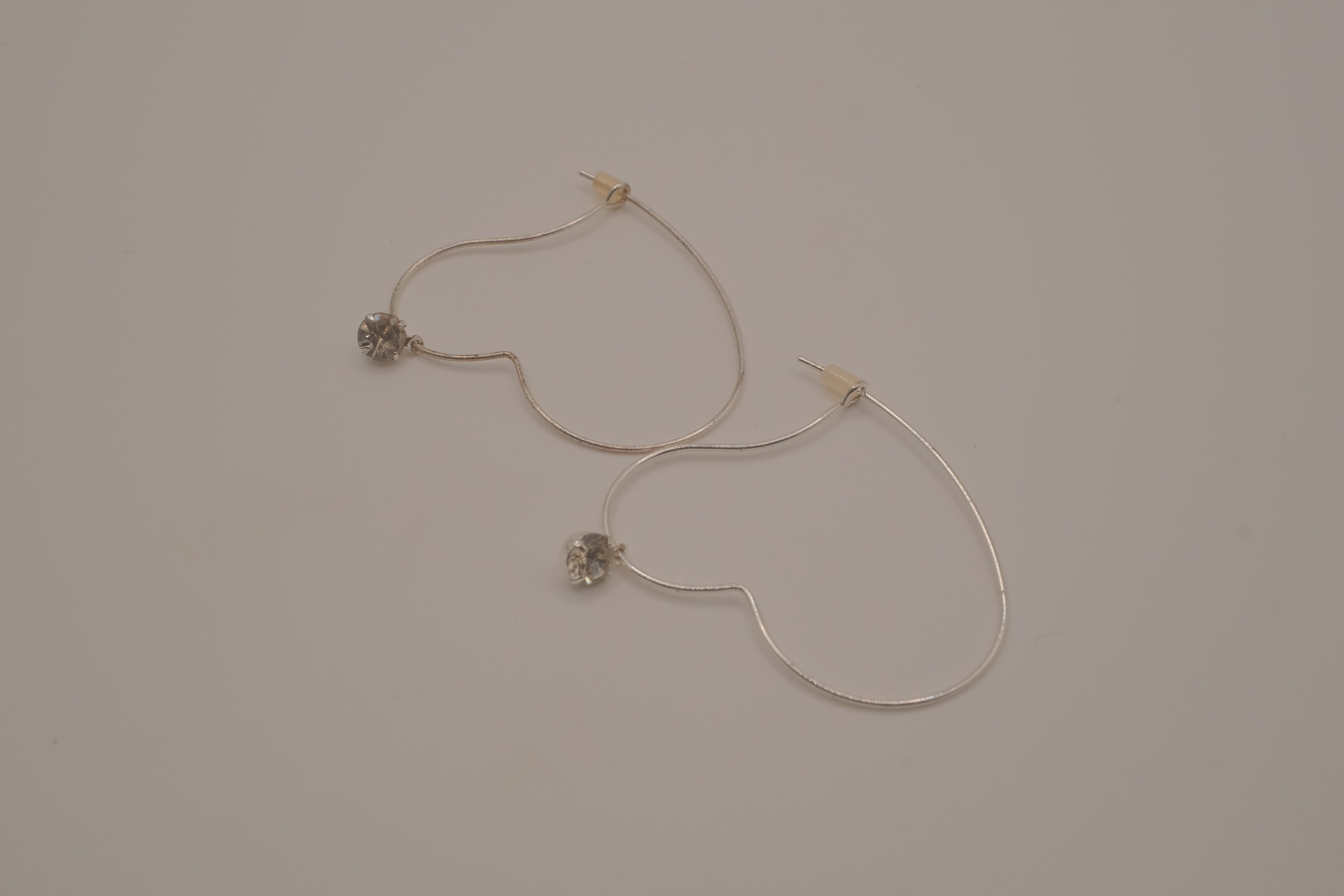 Vintage Avon silver-tone heart hoop earrings