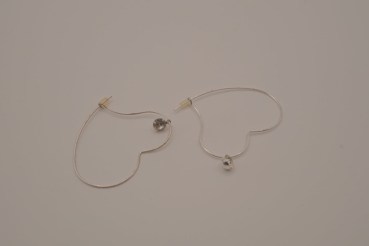 Vintage Avon silver-tone heart hoop earrings