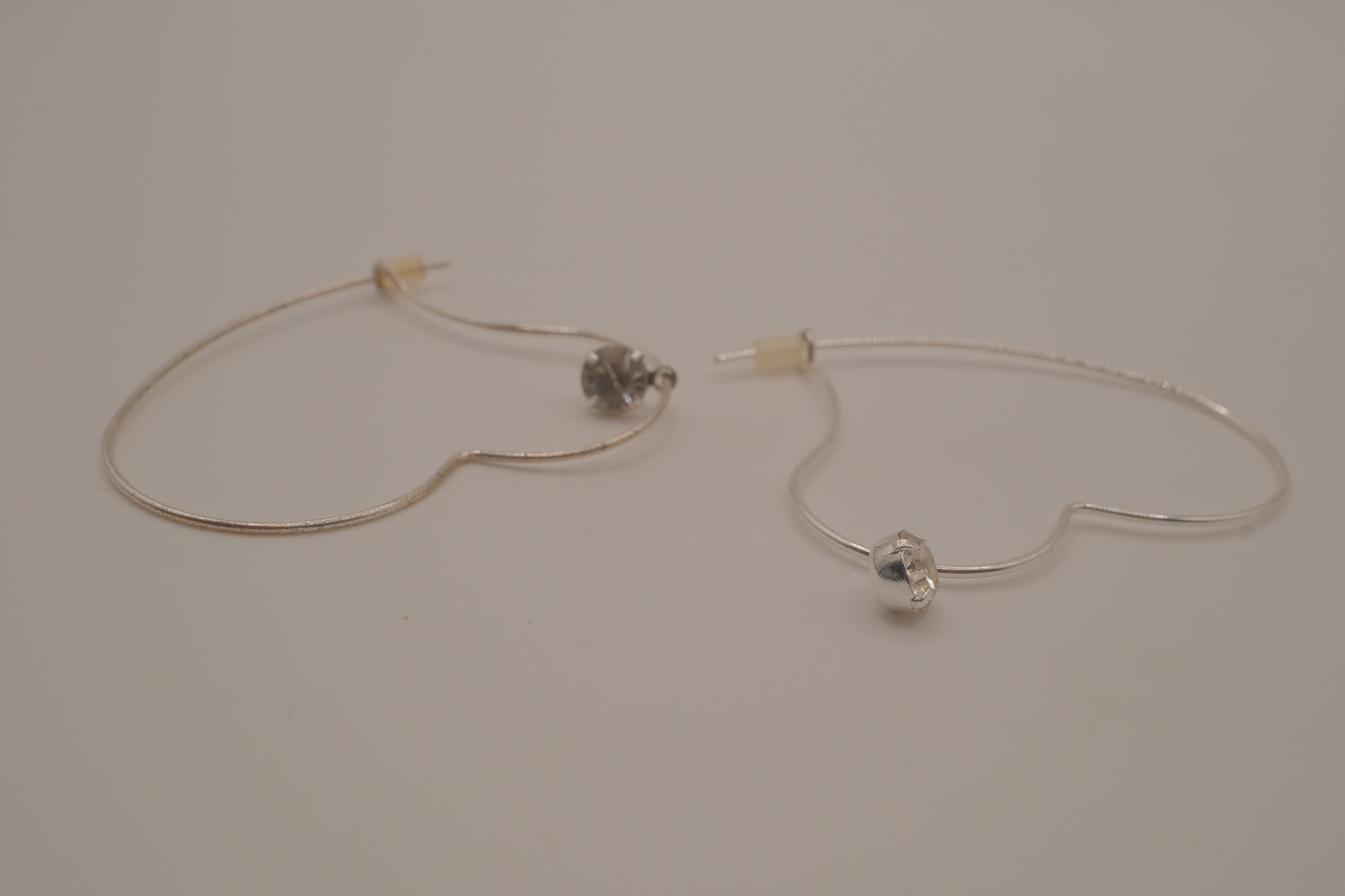 Vintage Avon silver-tone heart hoop earrings
