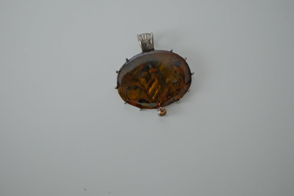 Oval shaped Amber pendant