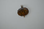 Oval shaped Amber pendant