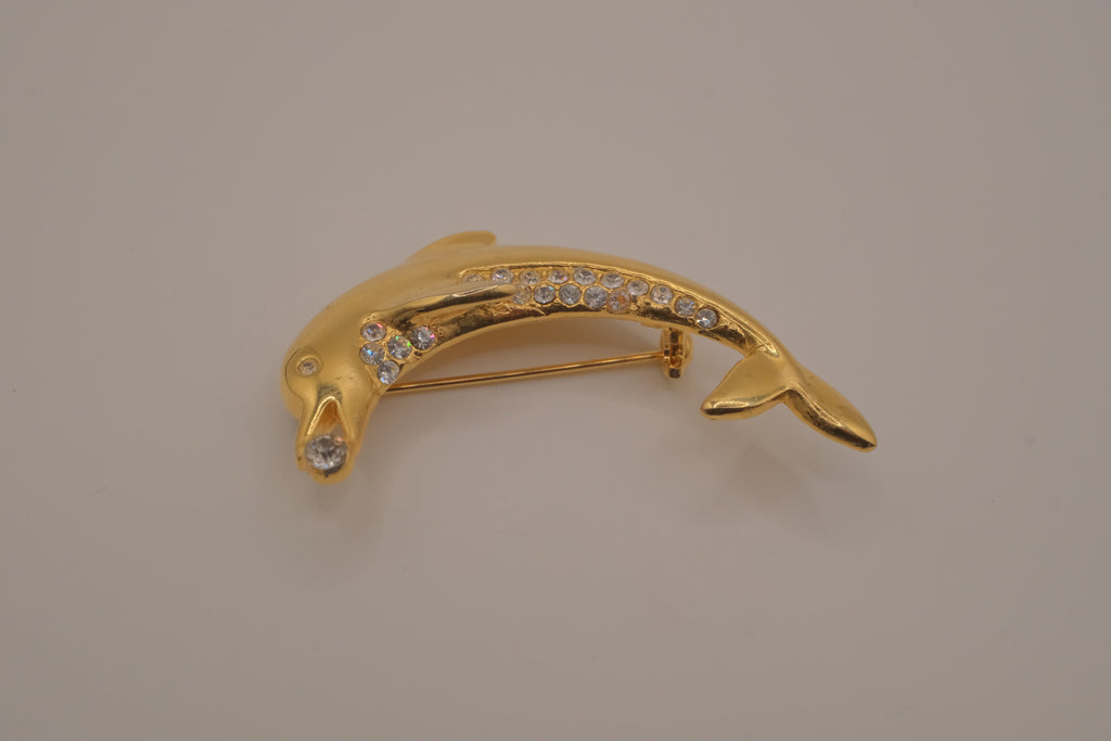 Vintage gold-tone leaping dolphin brooch pin