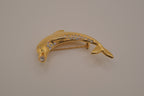 Vintage gold-tone leaping dolphin brooch pin