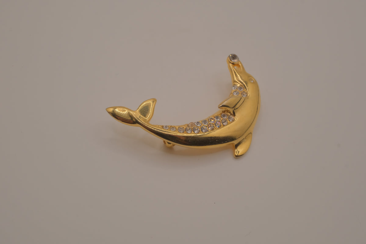 Vintage gold-tone leaping dolphin brooch pin