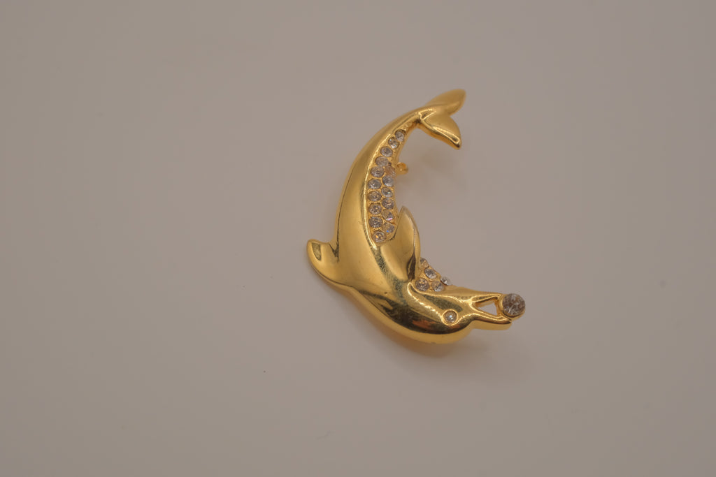Vintage gold-tone leaping dolphin brooch pin