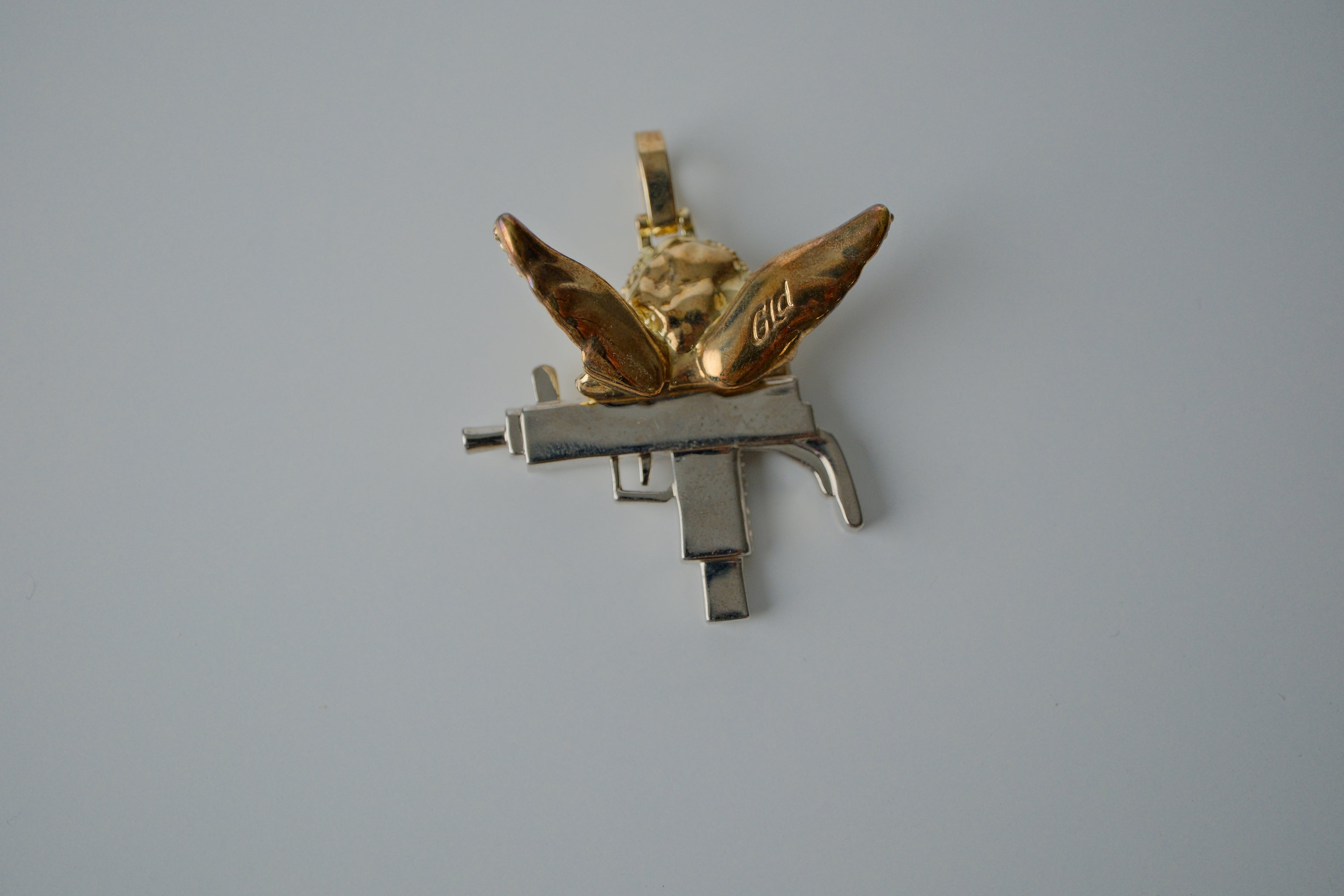 Two Tone Angel with Gun Pendant