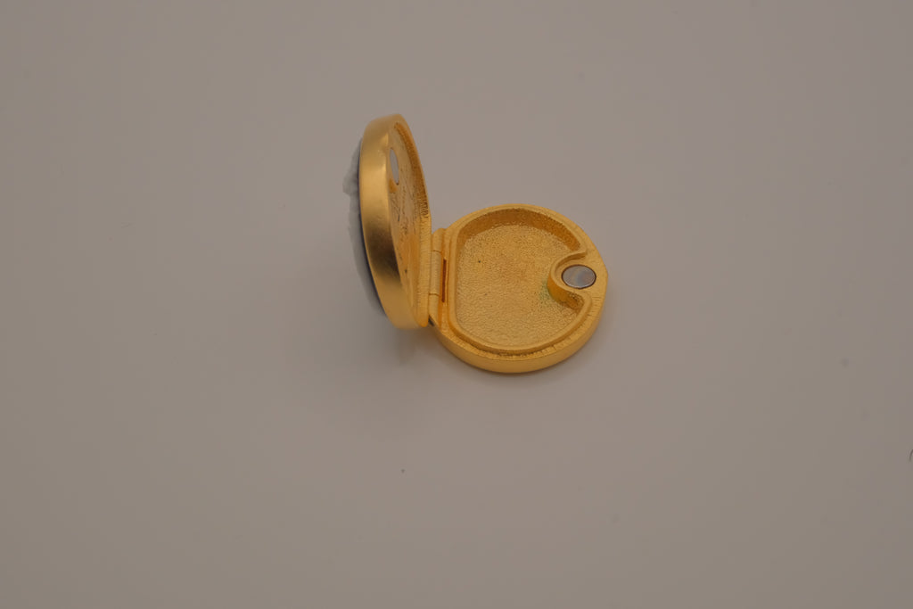 Estée Lauder "Timeless Cameo" solid perfume compact