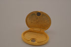 Estée Lauder "Timeless Cameo" solid perfume compact