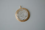 Two-tone interlocking circle pendant