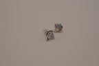 Silver toned dolphin stud earrings&nbsp;