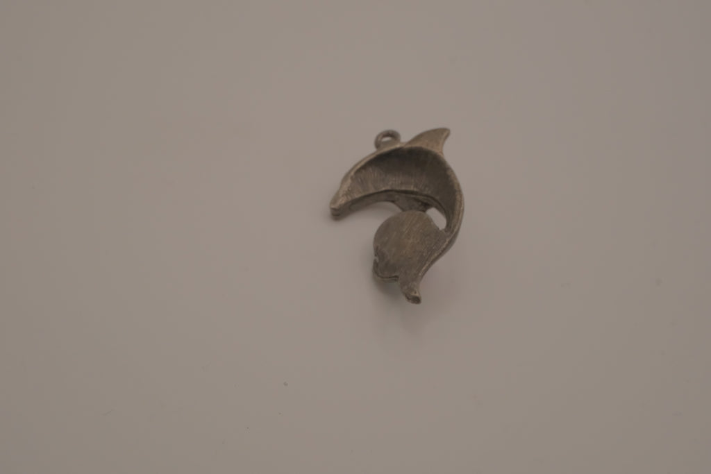 Vintage pewter dolphin pendant with an iridescent glass orb
